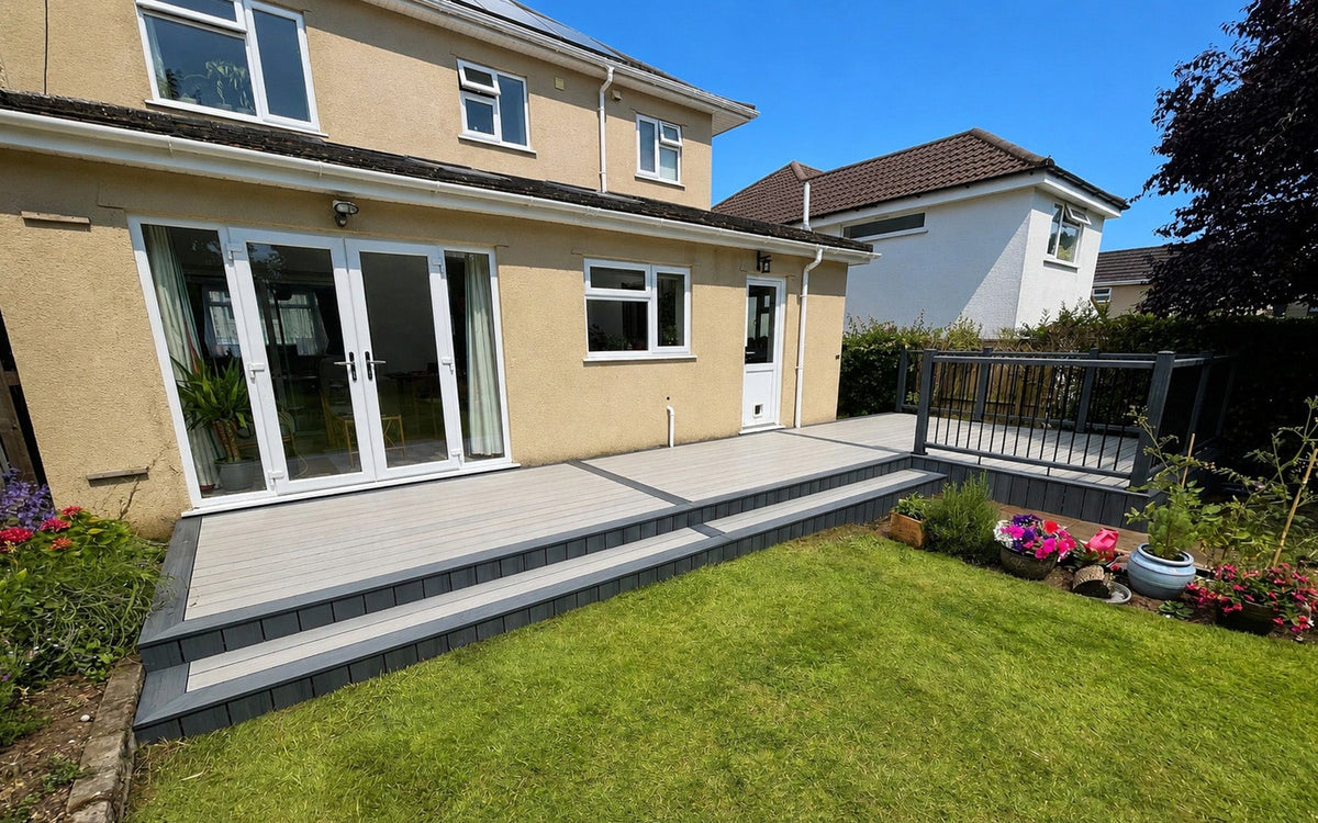 NeoTimber® Silver Birch Composite Decking with Grey Framing, Composite Balustrade and Garden Planters
