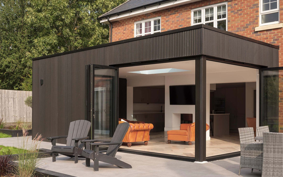 Slatted composite cladding