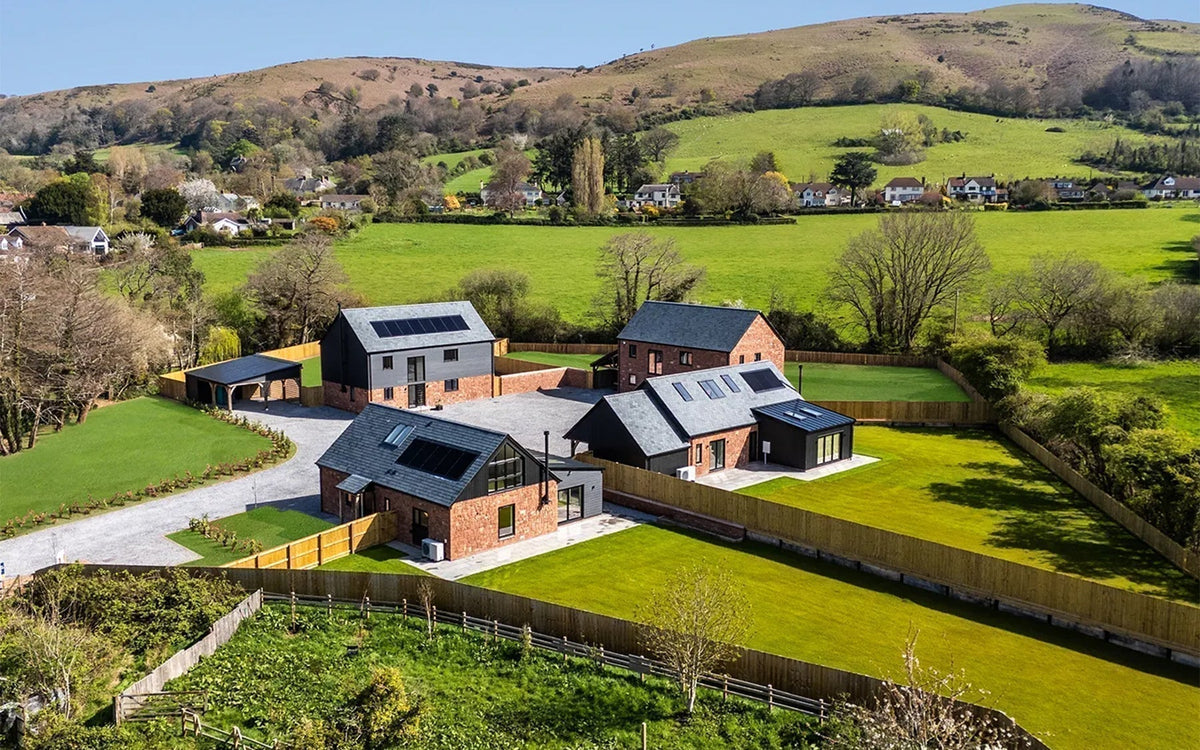NeoTimber Charcoal woodgrain composite cladding on a home at Stable Court, Bicknoller