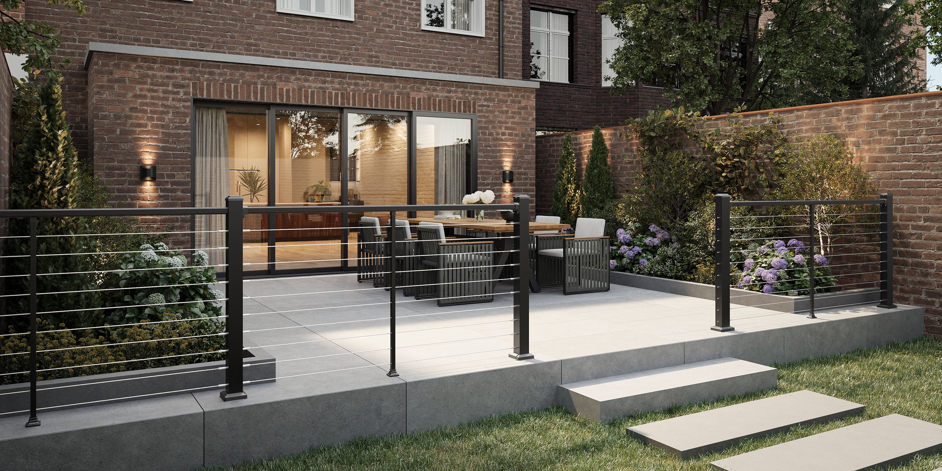 modern outdoor patio with a brick building, garden furniture, wire aluminium balustrades, and decorative elements