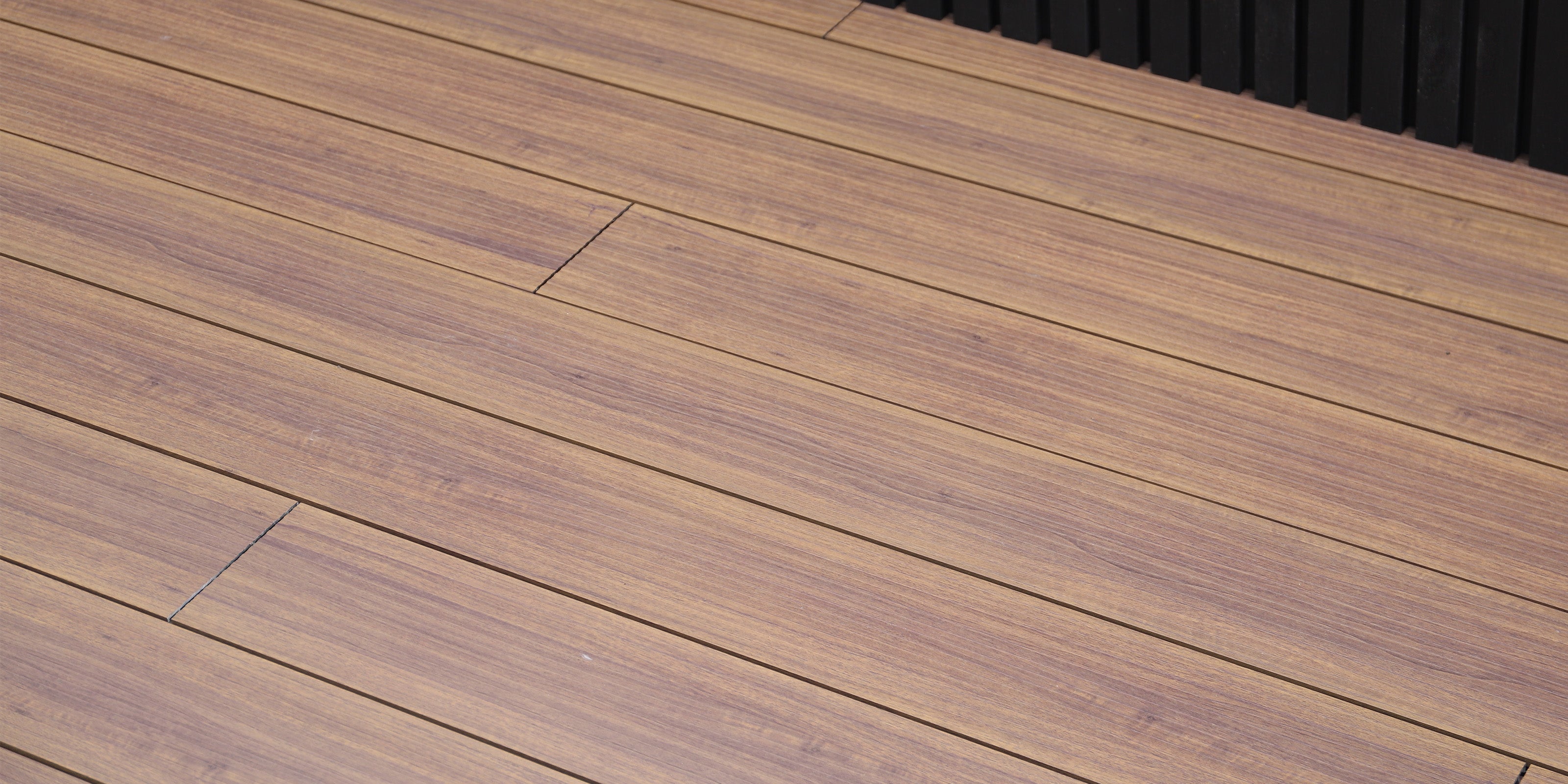 neotimber aluminium decking image gallery - close-up of an aluminium deck with horizontal boards