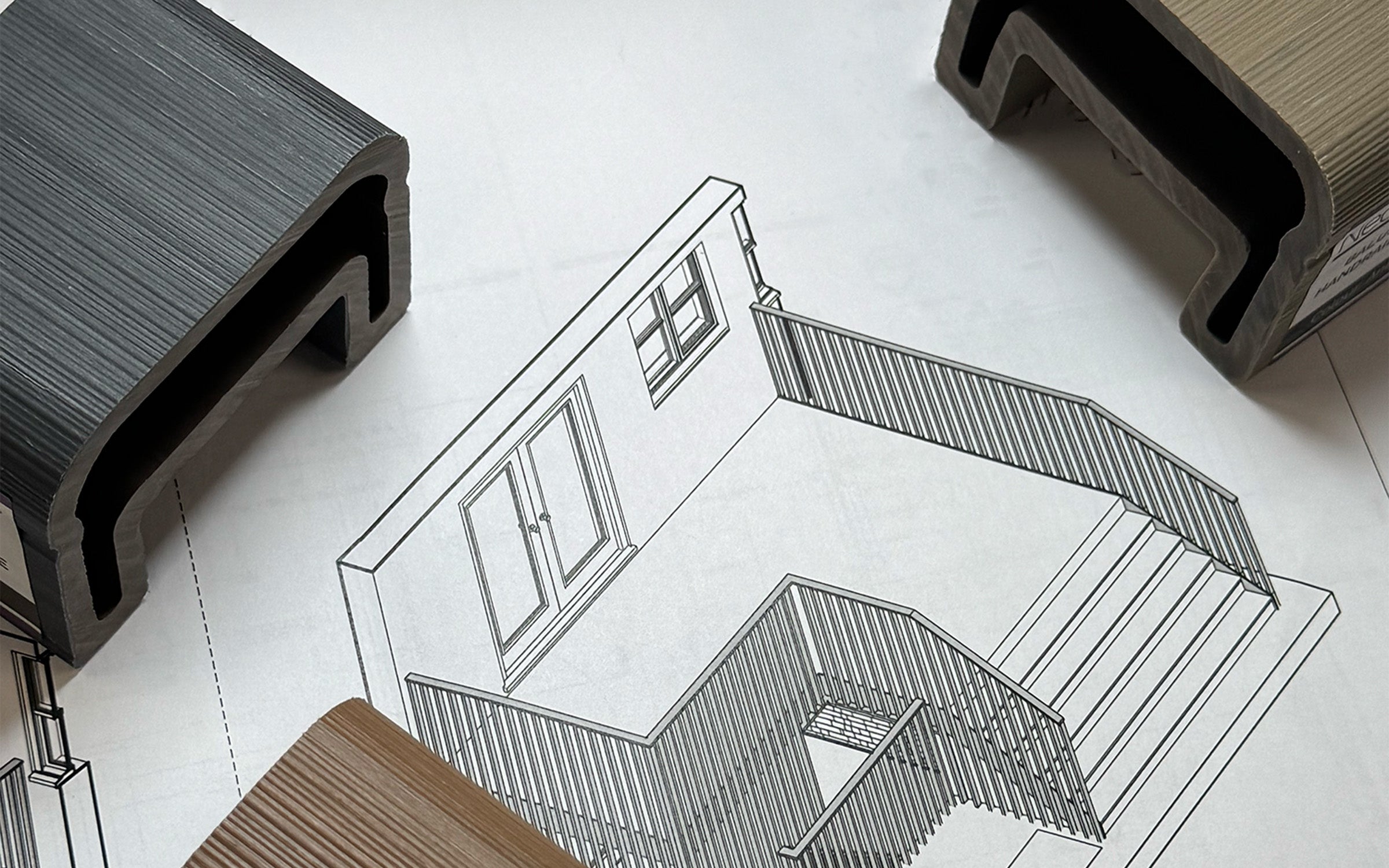 neotimber composite balustrade samples on top of architectural drawing