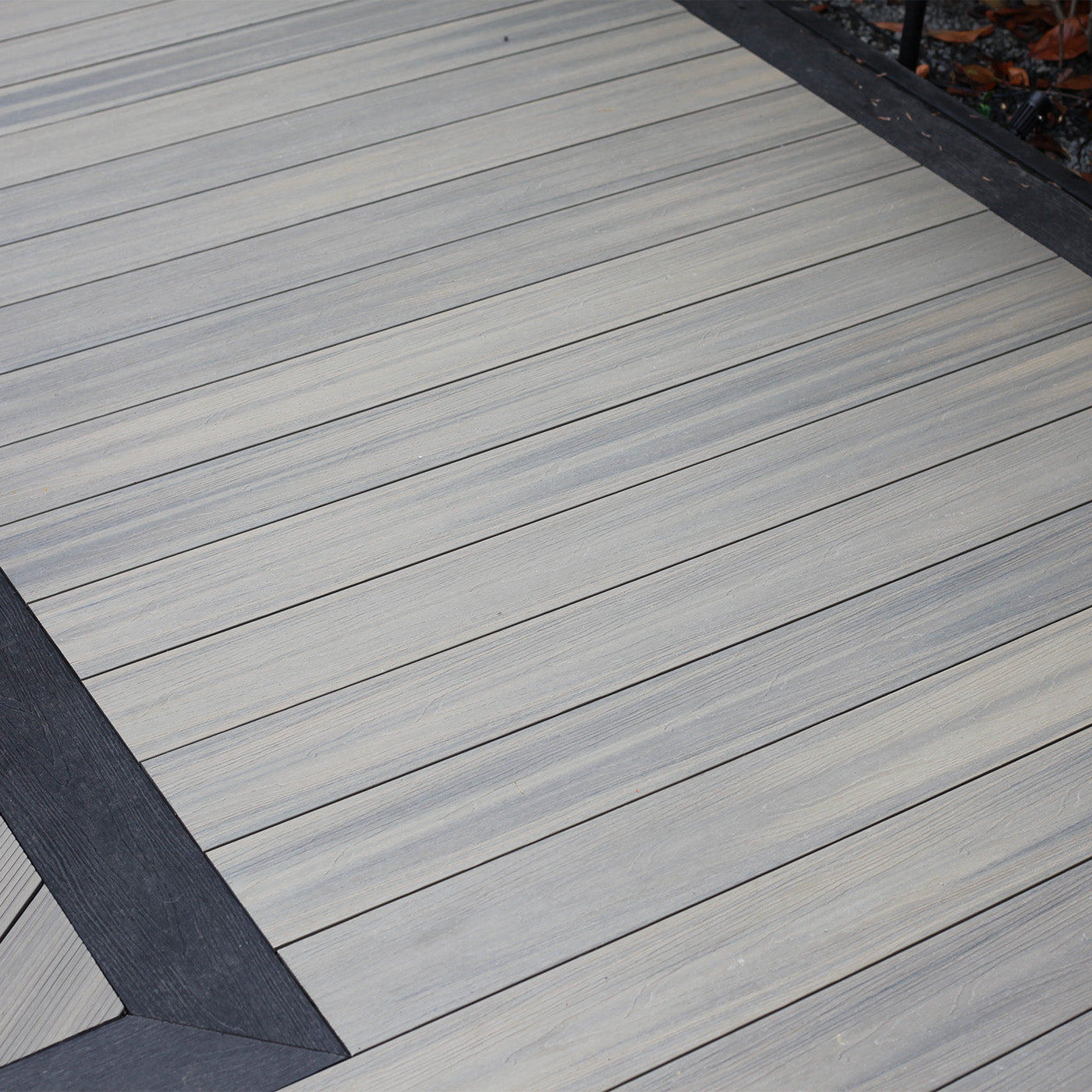 dual-tone composite decking showcasing natural colour variations throughout the board surface