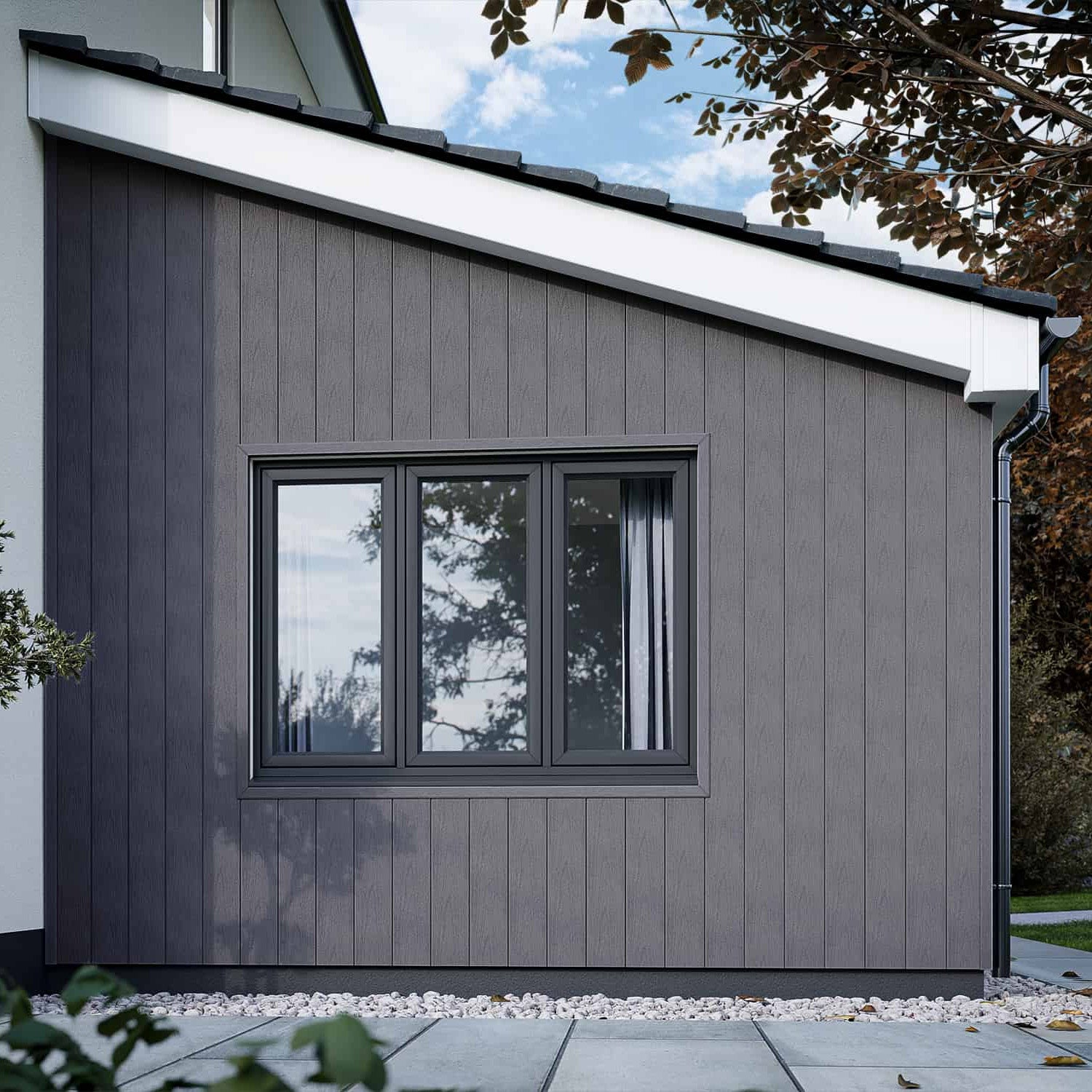 modern house exterior with grey composite cladding and a window