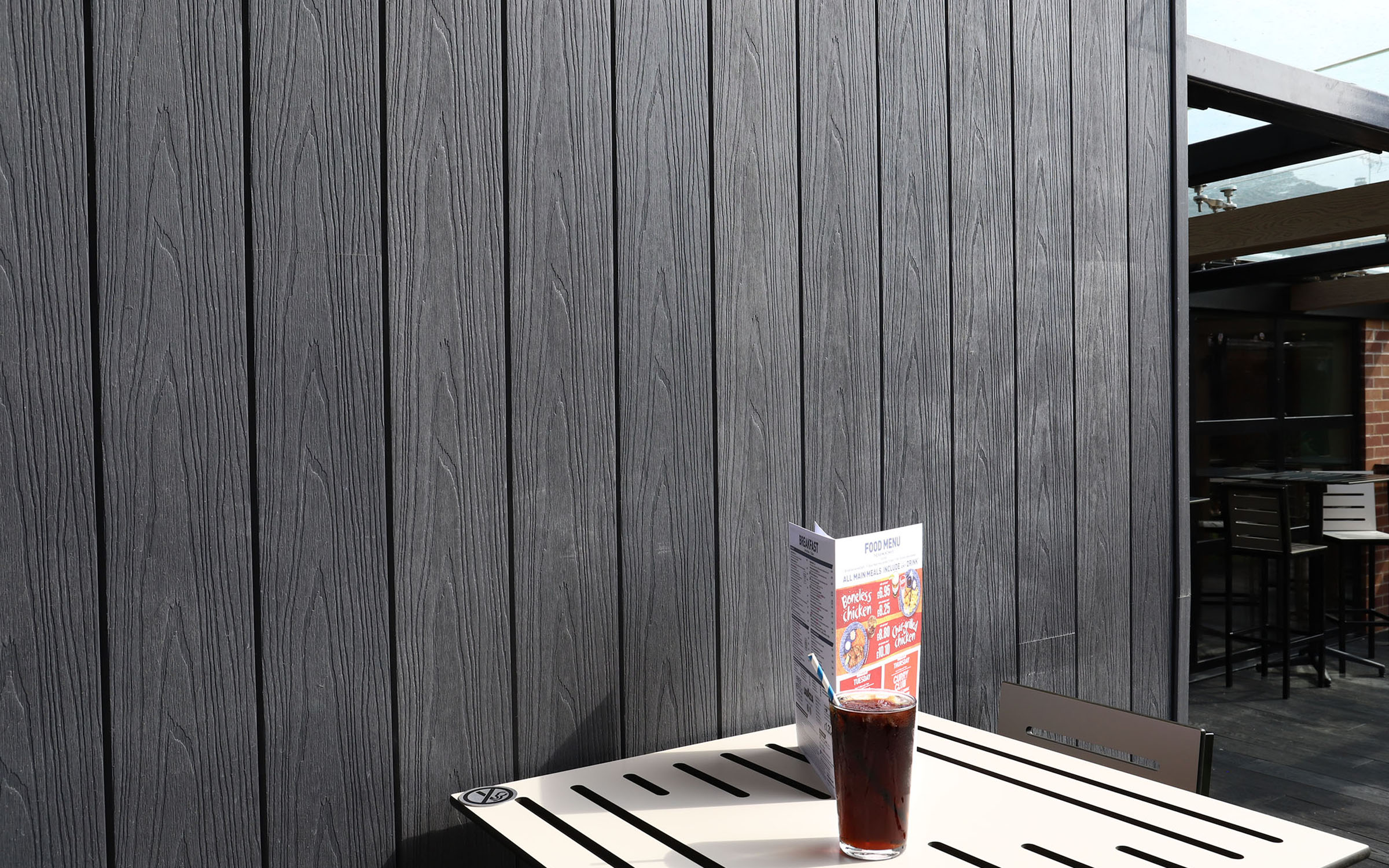 Wetherspoon pub exterior featuring NeoTimber® Deluxe Grey composite wall cladding