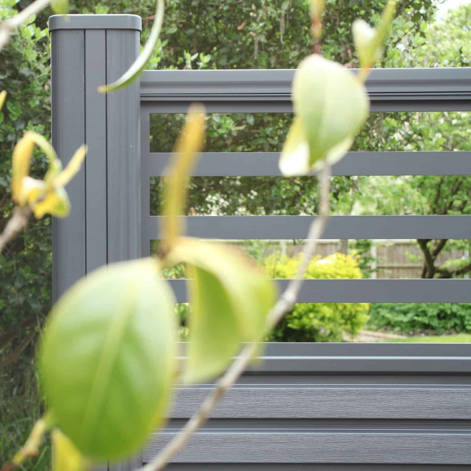 NeoTimber® Slatted Fence Panel Set with Linear Screen – Grey Completed Installation