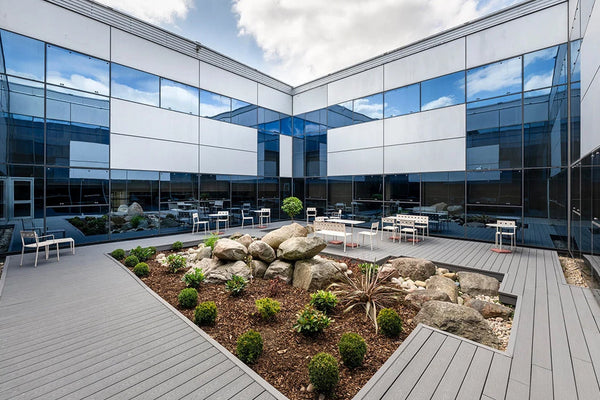 Classic Grey Decking Transforms The Smiths News Office Courtyard