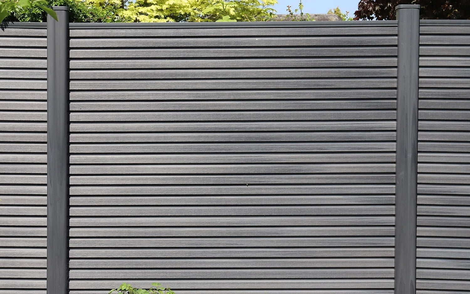 190 Metres Of Grey Slatted Composite Fencing Transforms A Modern Garden