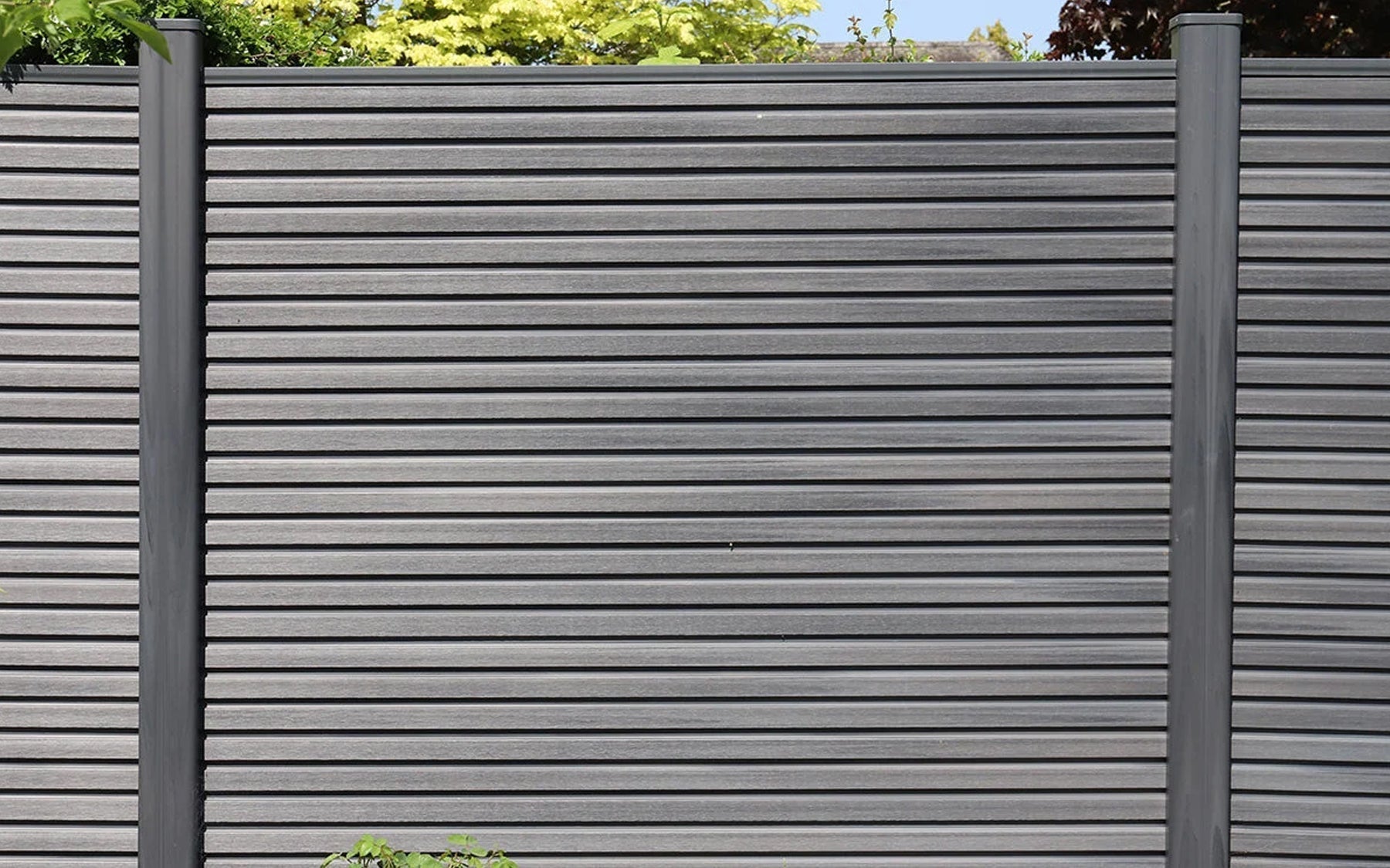 190 Metres Of Grey Slatted Composite Fencing Transforms A Modern Garden