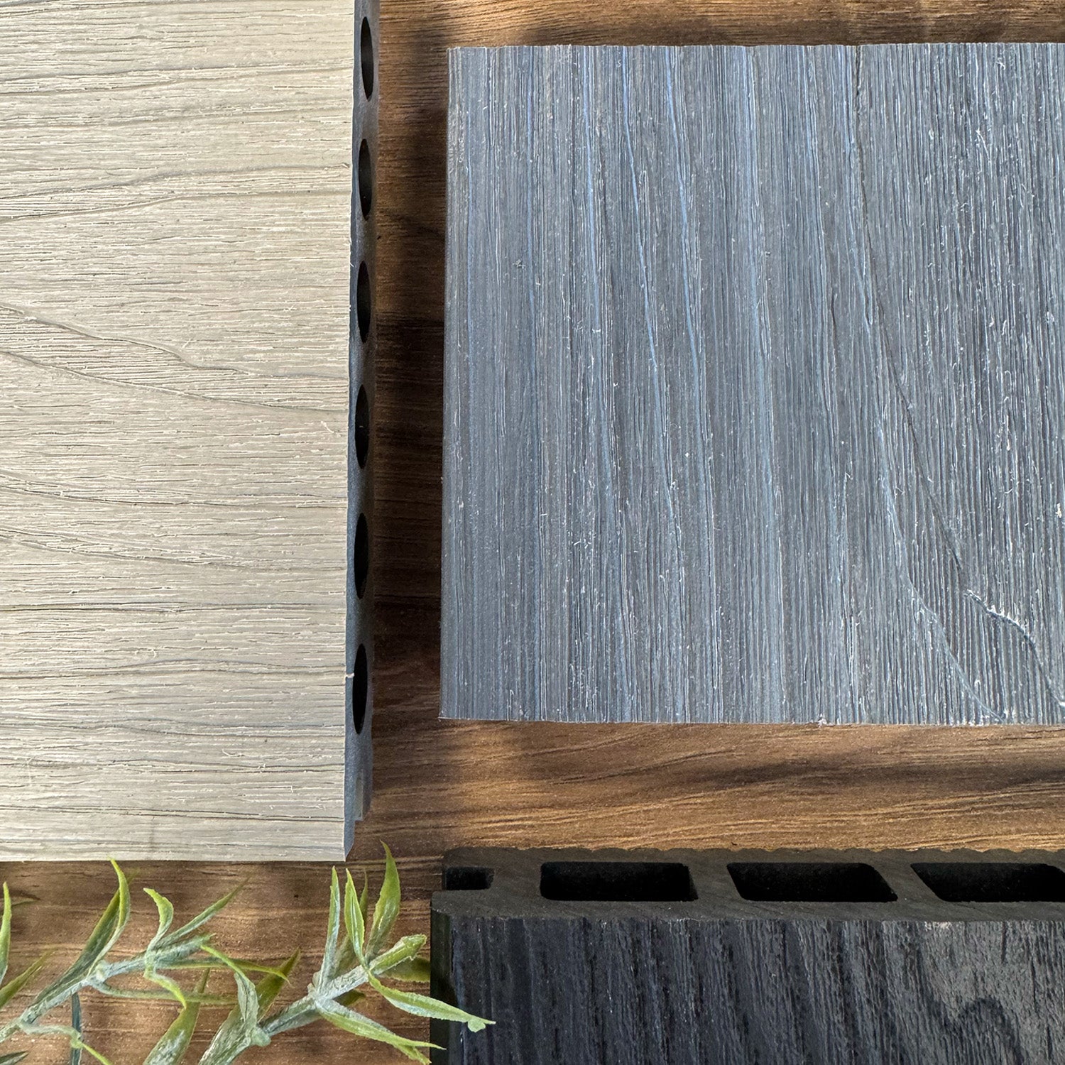 close-up of neotimber material textures with a plant in the corner