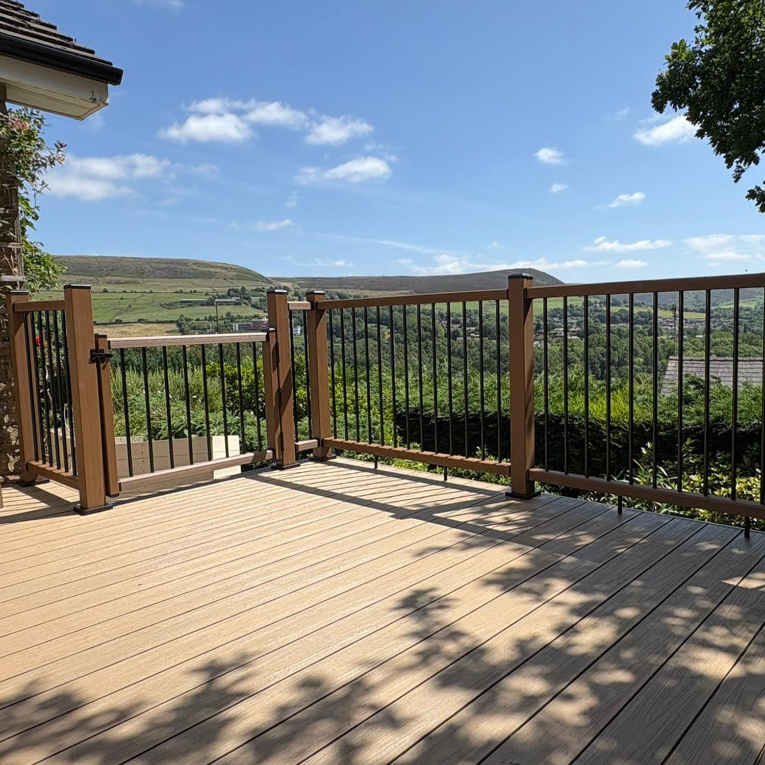 NeoTimber® Teak Composite Balustrades and Gate with Matching Composite Deck and Scenic Views