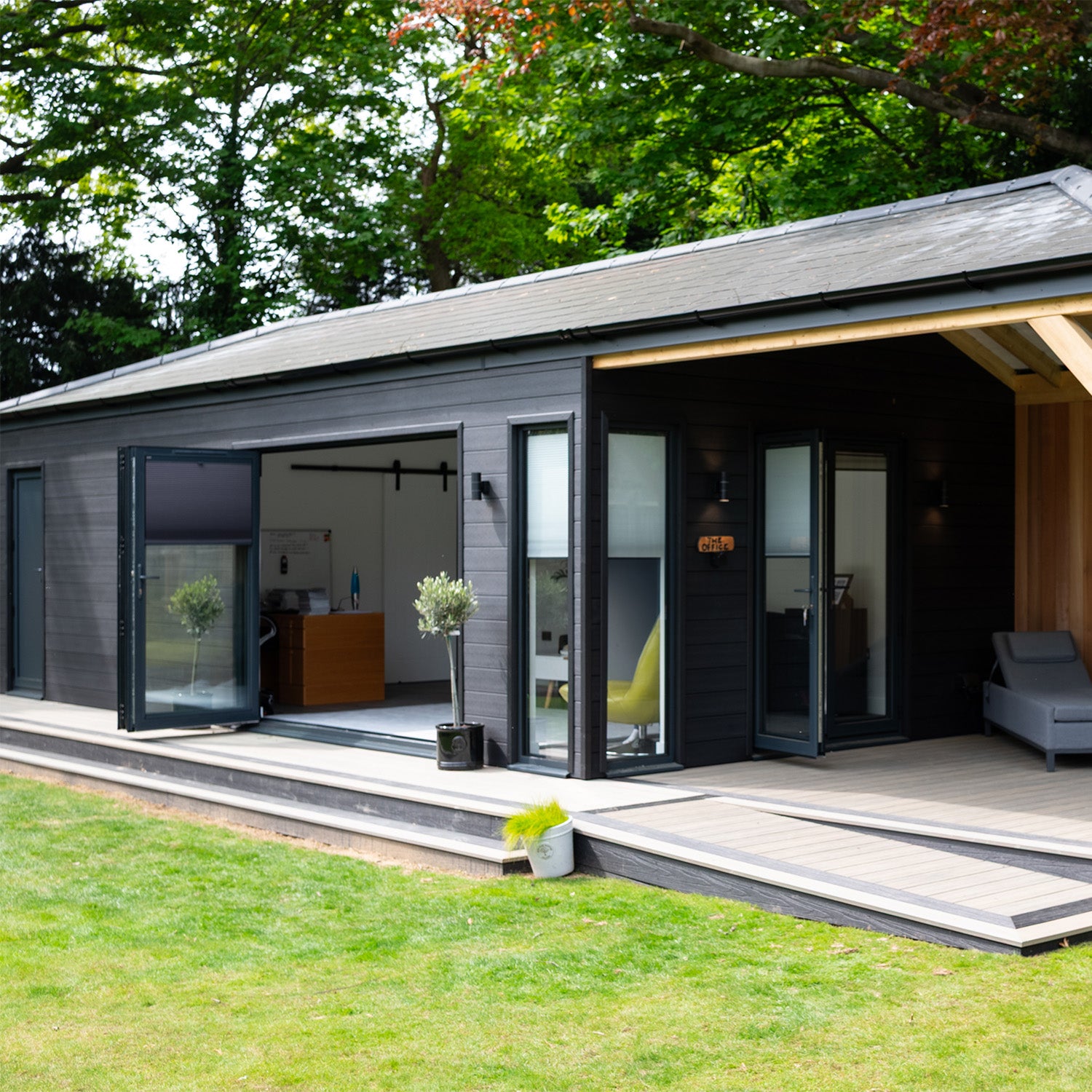 NeoTimber Deluxe Brushed Charcoal Composite Cladding – Completed Cabin Installation