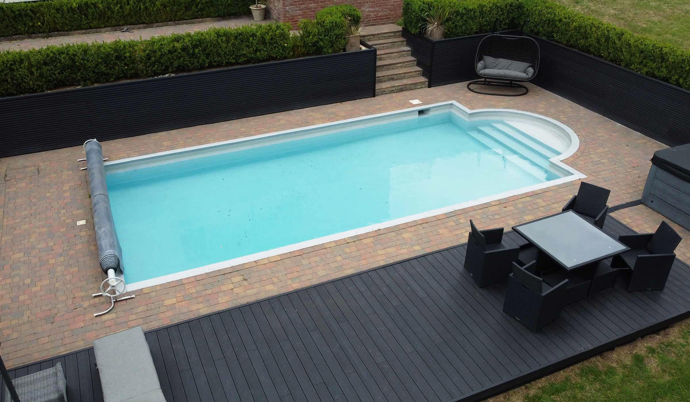 Deluxe Composite Decking in Charcoal with Slatted Cladding Around Outdoor Pool