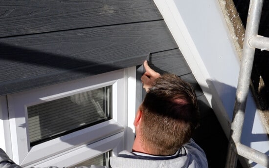 is composite cladding cheaper than wood?