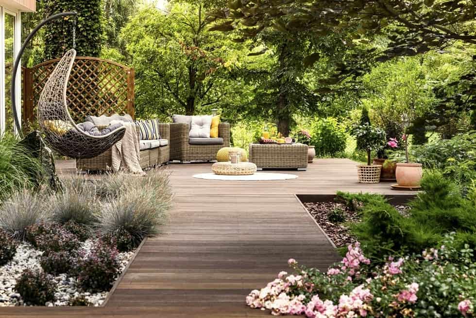 bigstock-Wooden-Terrace-Surrounded-By-G-242209117-resized low maintenance outdoor space