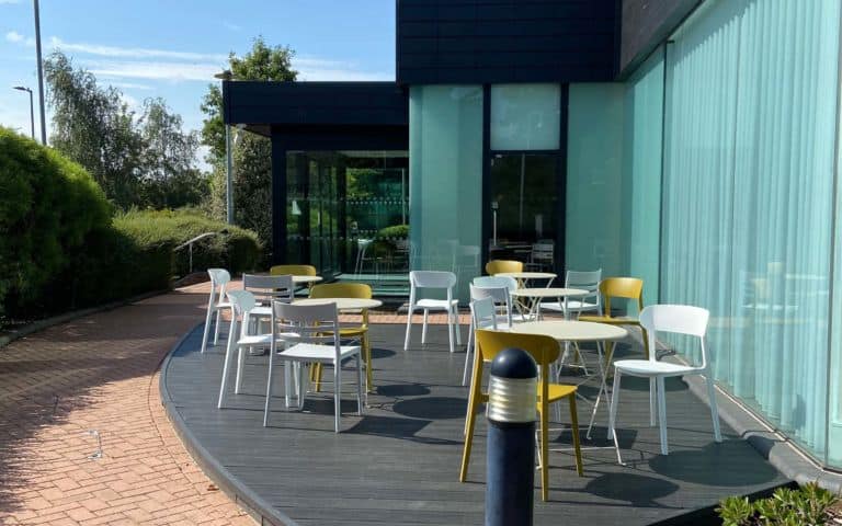 Charcoal Deluxe Commercial Composite Decking Seating Area