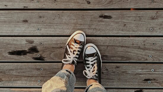 girl standing on timber decking